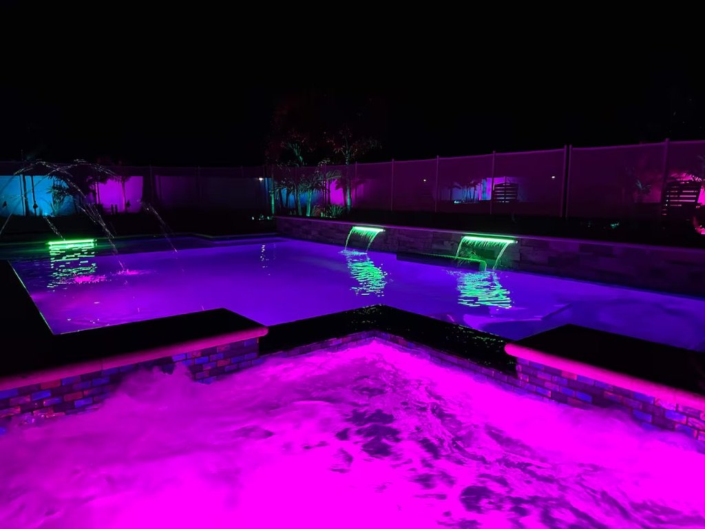 Seaside Boca resort pool with LED lighting at night